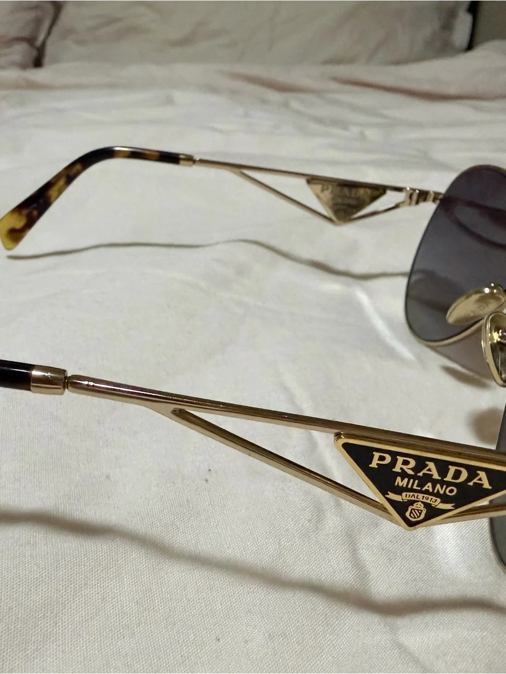 Prada Gold Aviator Sunglasses with Gradient Gray Lenses